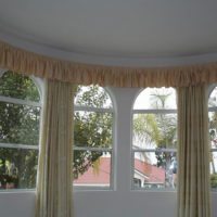 Curved curtain track with valance